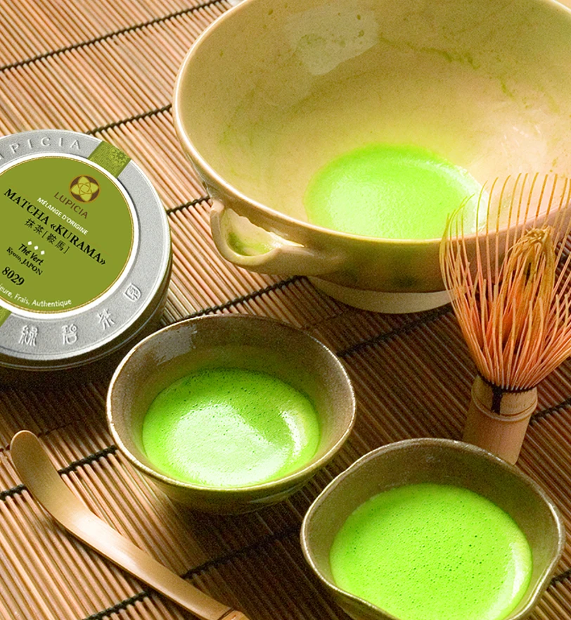 Matcha tea with a bowl, whisk and matcha powder